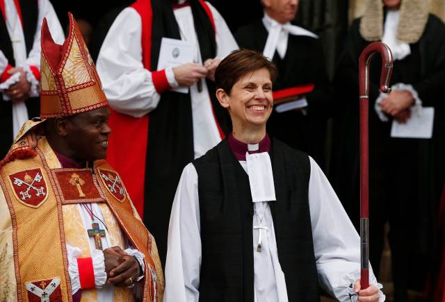The first female bishop in the Church of England Libby Lane steps outside following her consecration service at York Minster in York