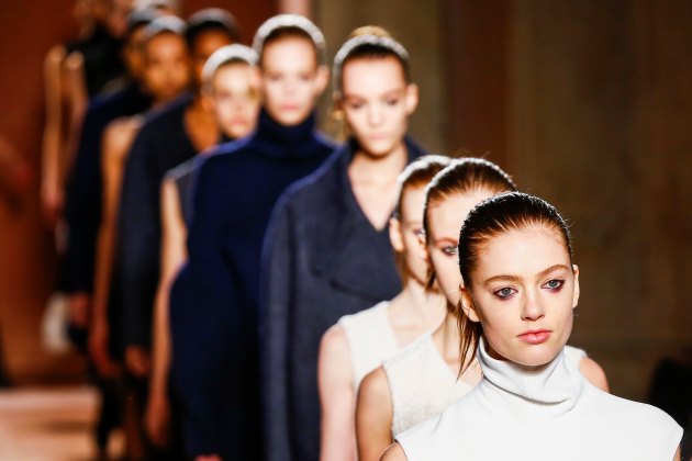 Models present creations from the Victoria Beckham Fall/Winter 2015 collection during New York Fashion Week