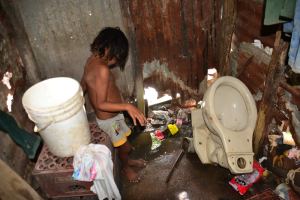 Así viven las familias del barrio Brisas de Venezuela (Fotos)