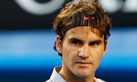 Roger Federer pumps his fist