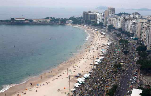 Residents protest against Brazil's President Dilma Rousseff at Copacabana beach in Rio de Janeiro