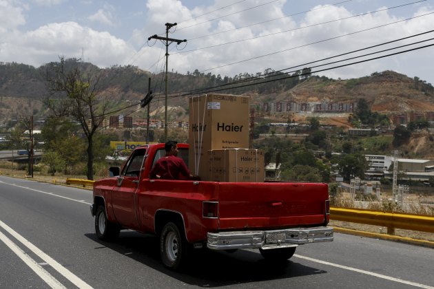 A truck loaded with Haier products is seen on a highway in Caracas