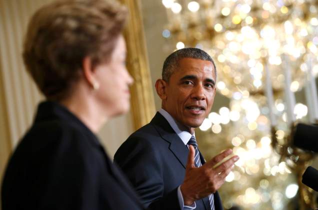 U.S. President Obama turns to Brazil President Rousseff during joint news conference at the White House in Washington
