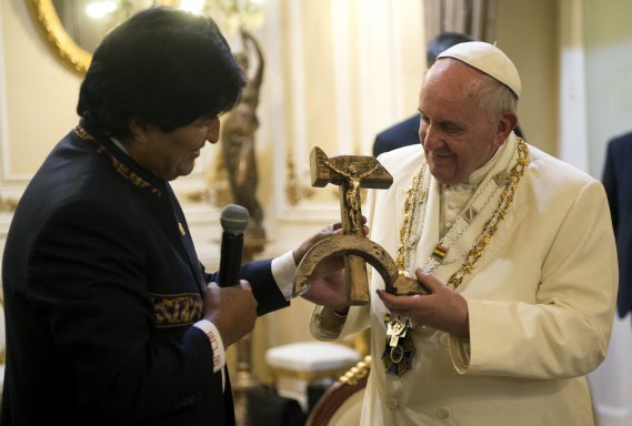 Pope Francis receives a gift from Bolivian President Evo Morales in La Paz