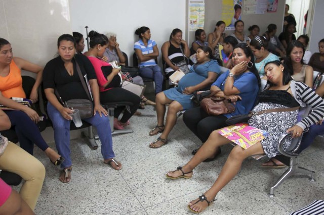 Pregnant women wait for their turn to be attended at a maternity hospital in Maracaibo, Venezuela