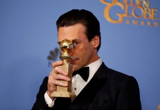 Jon Hamm poses backstage with his award for Best Performance by an Actor In A Television Series - Drama for his role in "Mad Men" during the 73rd Golden Globe Awards in Beverly Hills, California January 10, 2016.  REUTERS/Lucy Nicholson