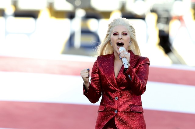 SANTA CLARA, CA - FEBRUARY 07: Recording artist Lady Gaga performs the national anthem prior to Super Bowl 50 between the Denver Broncos and the Carolina Panthers at Levi's Stadium on February 7, 2016 in Santa Clara, California.   Streeter Lecka/Getty Images/AFP