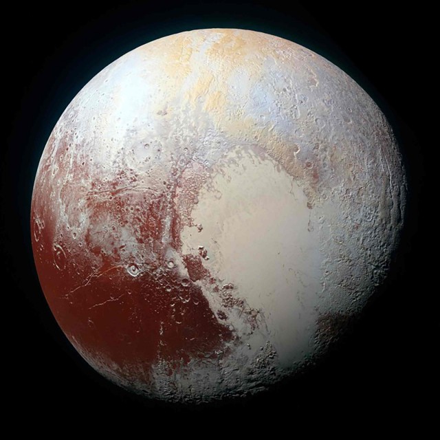 A heart shaped region named Sputnik Planum is seen in enhanced view of the dwarf planet Pluto in an undated image from NASA's New Horizons spacecraft. REUTERS/NASA/JHUAPL/SwRI/Handout via Reuters THIS IMAGE HAS BEEN SUPPLIED BY A THIRD PARTY. IT IS DISTRIBUTED, EXACTLY AS RECEIVED BY REUTERS, AS A SERVICE TO CLIENTS. FOR EDITORIAL USE ONLY. NOT FOR SALE FOR MARKETING OR ADVERTISING CAMPAIGNS
