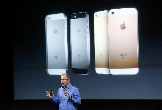 Apple Vice President Greg Joswiak introduces the iPhone SE during an event at the Apple headquarters in Cupertino, California March 21, 2016. REUTERS/Stephen Lam