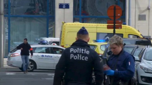 Emergency personnel are seen at the scene of a blast outside a metro station in Brussels, in this still image taken from video on March 22, 2016. REUTERS/Reuters TV