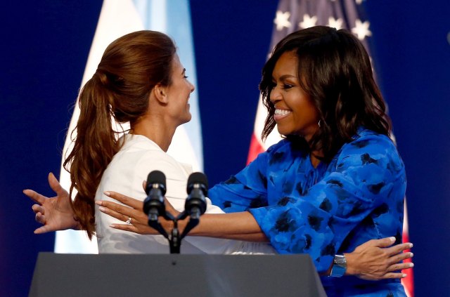 U.S. first lady Michelle Obama (R) is greeted by her Argentine countertpart Juliana Awada in Buenos Aires, March 23, 2016. REUTERS/Marcos Brindicci