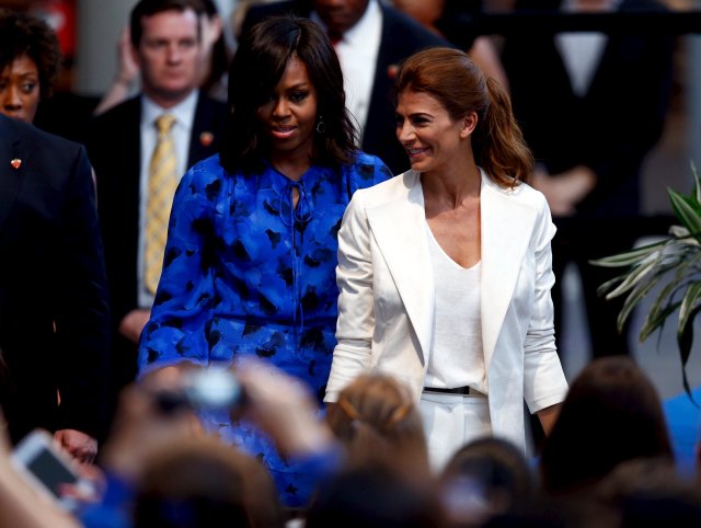 U.S. first lady Michelle Obama (L) and her Argentine countertpart Juliana Awada approach schoolgirls in Buenos Aires, March 23, 2016. REUTERS/Marcos Brindicci