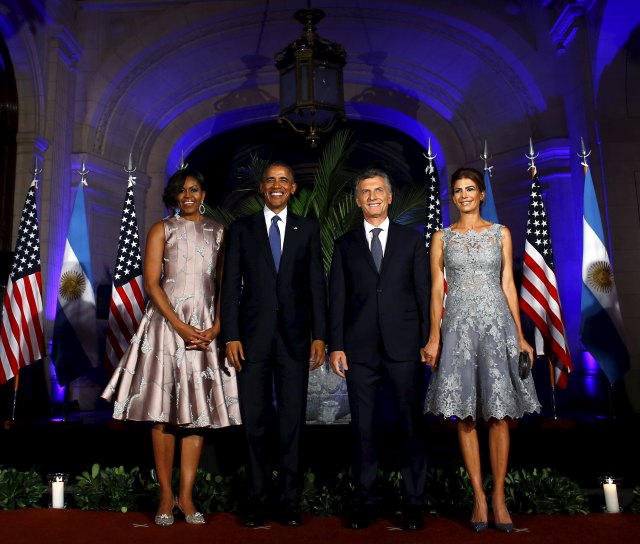 U.S. President Barack Obama (2nd L), Argentine President Mauricio Macri, U.S. first lady Michelle Obama (L) and Argentina's first lady Juliana Awada pose for a photo before a state dinner in Buenos Aires, March 23, 2016. REUTERS/Enrique Marcarian