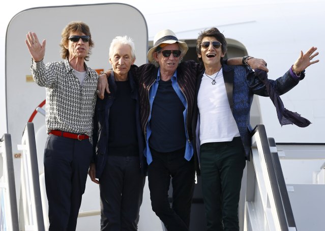 (L-R) Mick Jagger, Charlie Watts, Keith Richards and Ronnie Wood of the Rolling Stones stand together after landing in Havana, March 24, 2016. REUTERS/Ivan Alvarado