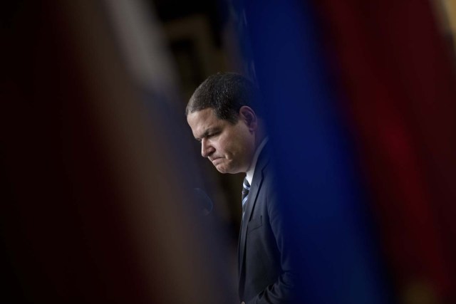 Luis Florido, a member of the opposition in the Venezuelan National Assembly, pauses while speaking to the press after a meeting with Luis Almagro, Secretary General of the Organisation of American States, at the Organisation of American States on May 20, 2016 in Washington, DC. / AFP PHOTO / Brendan Smialowski