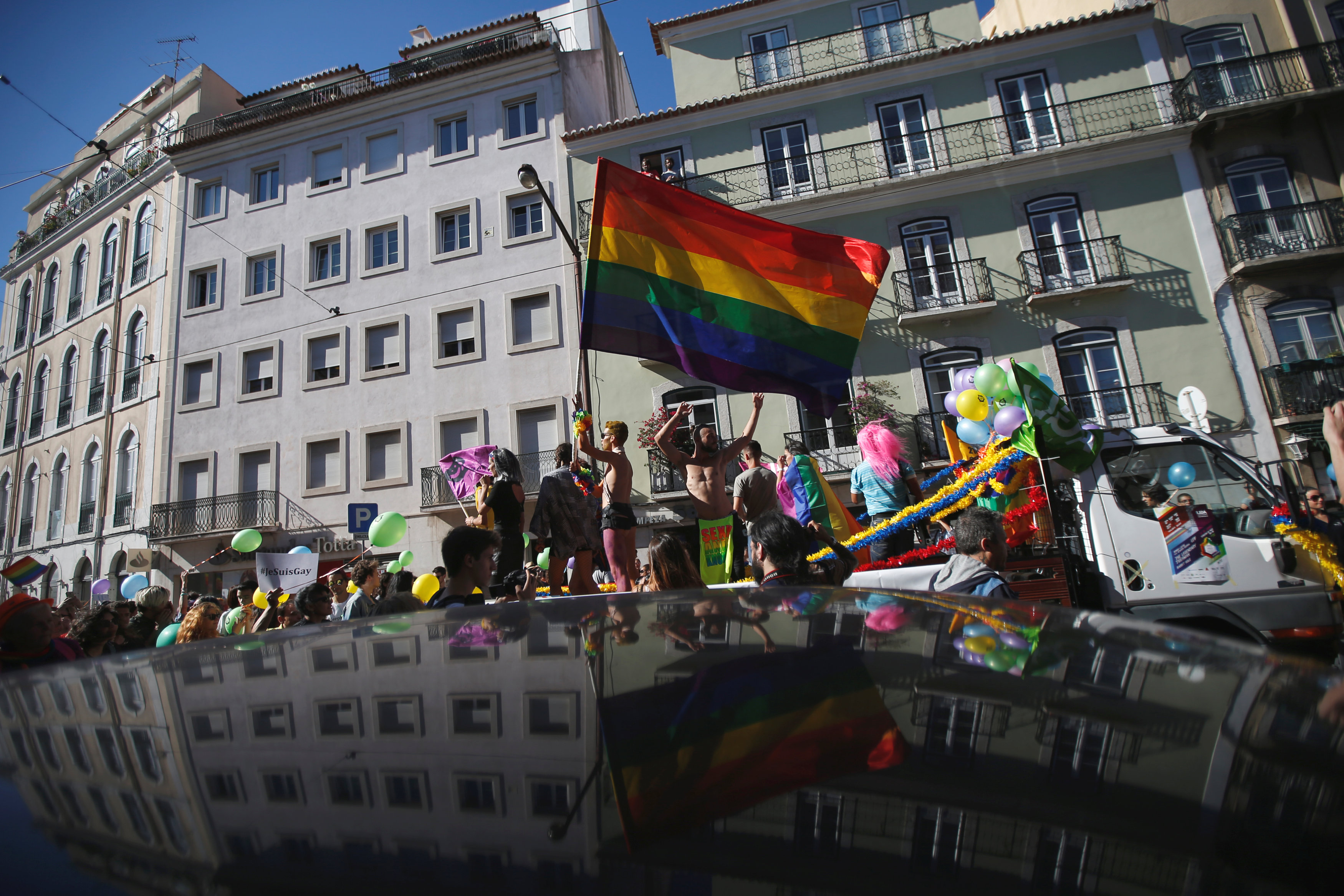 Participants march during a Gay Pride Parade in downtown Lisbon