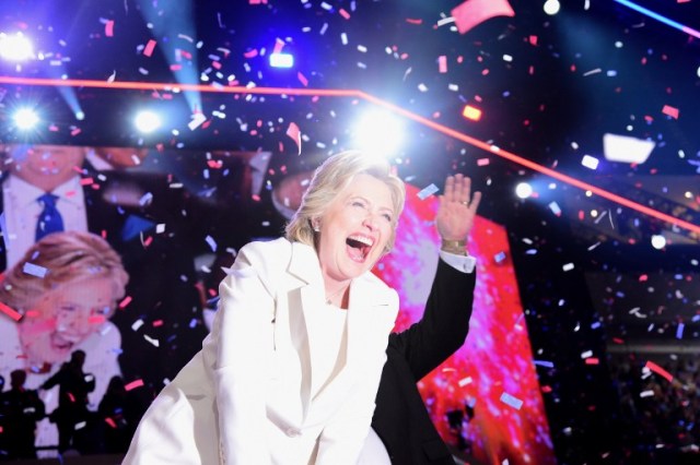 Democratic presidential nominee Hillary Clinton celebrates on stage after she accepted the nomination during the fourth and final night of the Democratic National Convention at the Wells Fargo Center, July 28, 2016 in Philadelphia, Pennsylvania. / AFP PHOTO / Robyn Beck