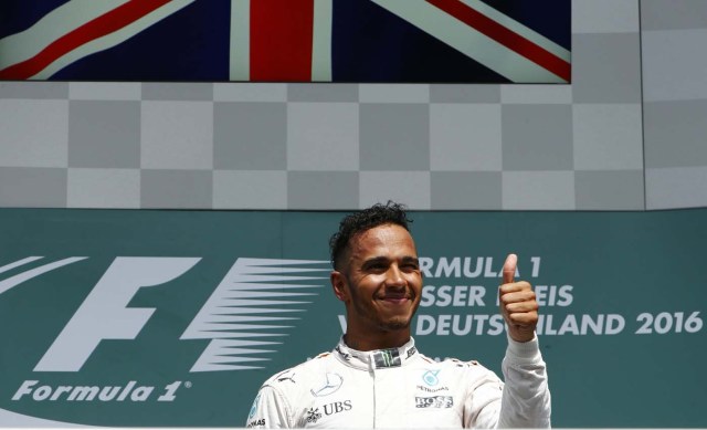Germany Formula One - F1 - German Grand Prix 2016 - Hockenheimring, Germany - 31/7/16 - Mercedes' Lewis Hamilton gives thumb up after winning the race. REUTERS/Ralph Orlowski