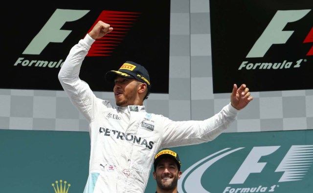 Germany Formula One - F1 - German Grand Prix 2016 - Hockenheimring, Germany - 31/7/16 - Mercedes' Lewis Hamilton celebrates after winning the race. REUTERS/Ralph Orlowski