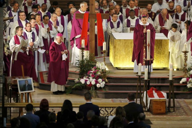 Archbishop of Rouen and Primate of Normandy Mgr Dominique Lebrun prays during a funeral service to slain French parish priest Father Jacques Hamel at the Cathedral in Rouen, France, August 2, 2016. Father Jacques Hamel was killed last week in an attack on a church at Saint-Etienne-du-Rouvray near Rouen that was carried out by assailants linked to Islamic State.   REUTERS/Charly Triballeau/Pool