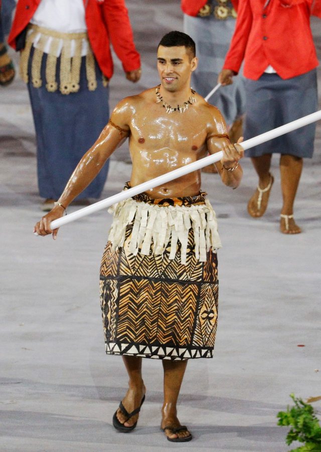 2016 Rio Olympics - Opening ceremony - Maracana - Rio de Janeiro, Brazil - 05/08/2016.Flagbearer Pita Nikolas Taufatofua (TGA) of Tonga leads his contingent during the athletes' parade at the opening ceremony. REUTERS/Stoyan Nenov FOR EDITORIAL USE ONLY. NOT FOR SALE FOR MARKETING OR ADVERTISING CAMPAIGNS.