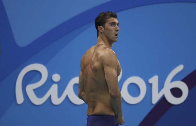2016 Rio Olympics - Swimming - Final - Men's 200m Butterfly Semifinals - Olympic Aquatics Stadium - Rio de Janeiro, Brazil - 08/08/2016. Michael Phelps (USA) of USA reacts. REUTERS/Stefan Wermuth FOR EDITORIAL USE ONLY. NOT FOR SALE FOR MARKETING OR ADVERTISING CAMPAIGNS.