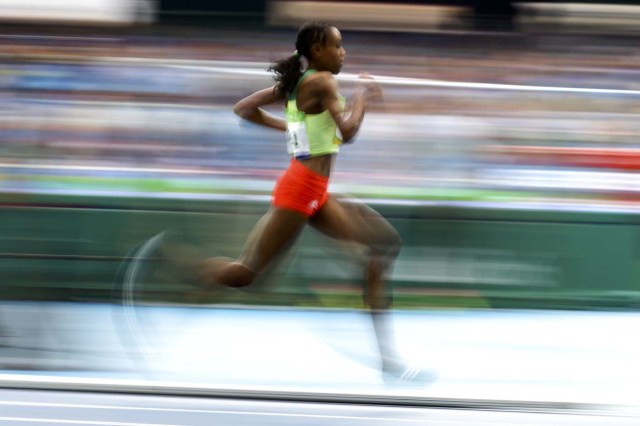 2016 Rio Olympics - Athletics - Final - Women's 10,000m Final - Olympic Stadium - Rio de Janeiro, Brazil - 12/08/2016. Almaz Ayana (ETH) of Ethiopia competes. REUTERS/Dylan Martinez  FOR EDITORIAL USE ONLY. NOT FOR SALE FOR MARKETING OR ADVERTISING CAMPAIGNS.  TPX IMAGES OF THE DAY