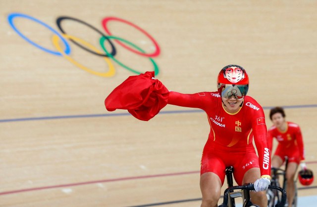 2016 Rio Olympics - Cycling Track - Final - Women's Team Sprint Final Gold Race - Rio Olympic Velodrome - Rio de Janeiro, Brazil - 12/08/2016. Gong Jinjie (CHN) of China celebrates. REUTERS/Eric Gaillard TPX IMAGES OF THE DAY. FOR EDITORIAL USE ONLY. NOT FOR SALE FOR MARKETING OR ADVERTISING CAMPAIGNS.