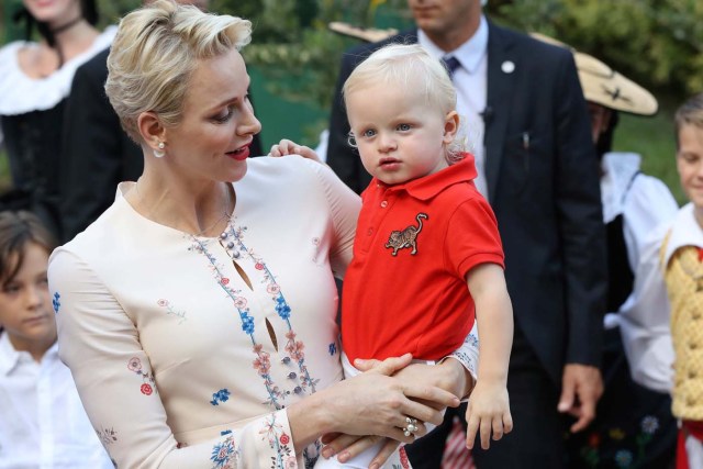 Princess Charlene of Monaco holds Prince Jacques, the heir apparent to the Monegasque throne during the traditional Monaco's picnic in Monaco, September 10, 2016. REUTERS/Valery Hache/Pool