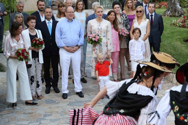 Prince Albert II of Monaco and his wife Charlene of Monaco attend a dance show with Prince Jacques, the heir apparent to the Monegasque throne during the traditional Monaco's picnic in Monaco, September 10, 2016. REUTERS/Valery Hache/Pool