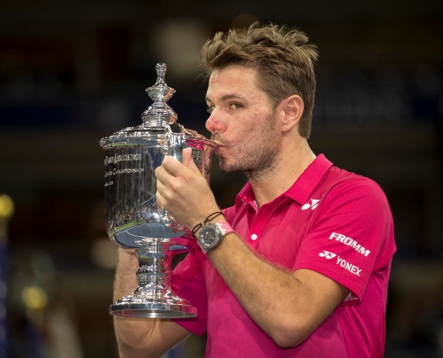 Sep 11, 2016; New York, NY, USA; Stan Wawrinka (SUI) poses with the trophy after his match against Novak Djokovic (SRB) on day fourteen of the 2016 U.S. Open tennis tournament at USTA Billie Jean King National Tennis Center. Mandatory Credit: Susan Mullane-USA TODAY Sports