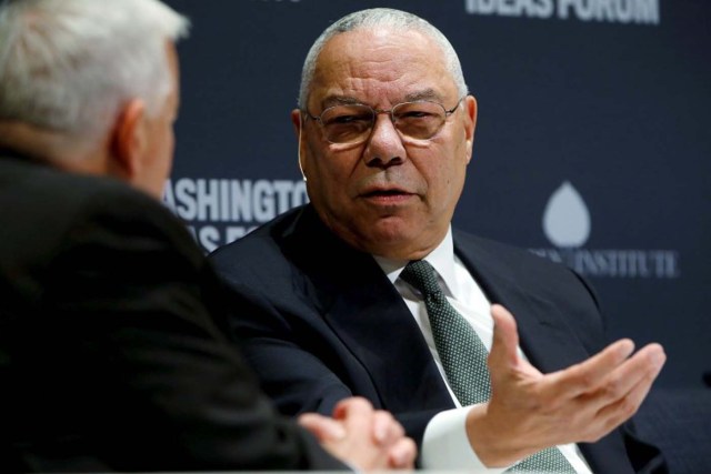 Former U.S. Secretary of State Colin Powell (R) takes part in an onstage interview with Aspen Institute President and CEO Walter Isaacson (L) at the Washington Ideas Forum in Washington, September 30, 2015. REUTERS/Jonathan Ernst/File Photo