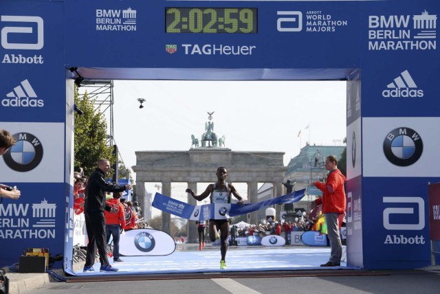 Kenenisa Bekele of Ethiopia crosses the finish line to win the men's competition at the Berlin marathon in Berlin, Germany, September 25, 2016. REUTERS/Fabrizio Bensch