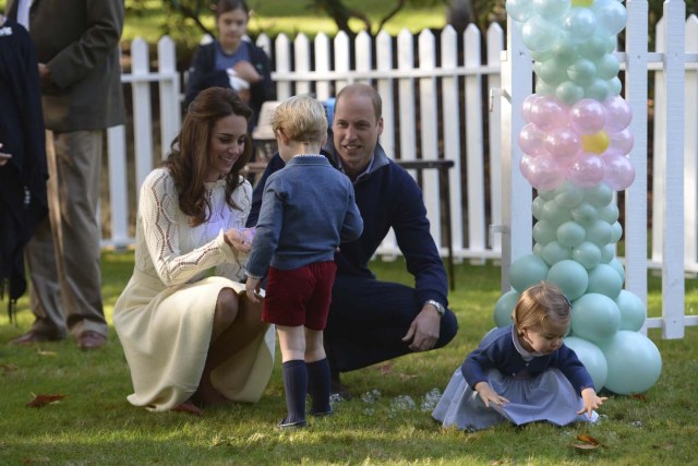 Britain's Prince William and his wife Kate, the Duke and Duchess of Cambridge, take part in a tea party with their children Prince George and Princess Charlotte at Government House in Victoria, British Columbia, Canada September 29, 2016.    REUTERS/Jonathan Hayward/Pool