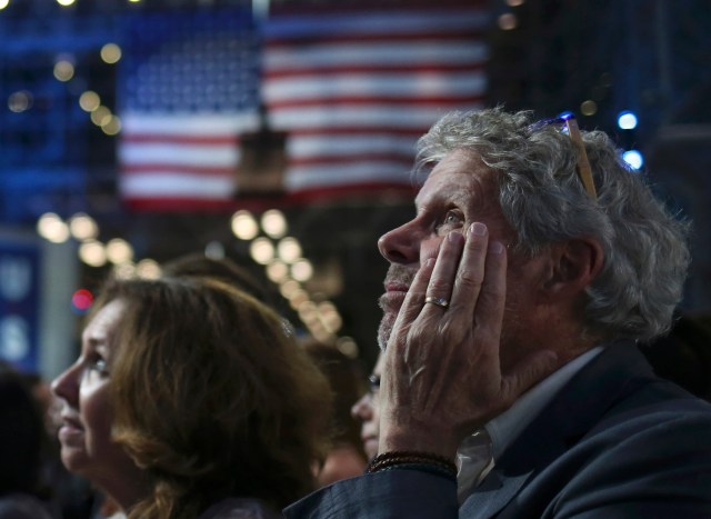 QUALITY REPEAT - A man reacts to returns at Democratic U.S. presidential nominee Hillary Clinton's election night rally the Jacob K. Javits Convention Center in New York, U.S., November 8, 2016. REUTERS/Adrees Latif