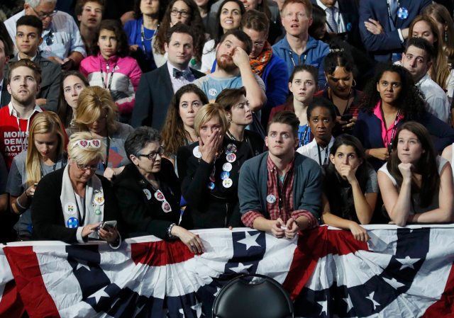 Supporters of Democratic U.S. presidential nominee Hillary Clinton react as they watch election returns at the election night rally in New York, U.S., November 8, 2016. REUTERS/Rick Wilking