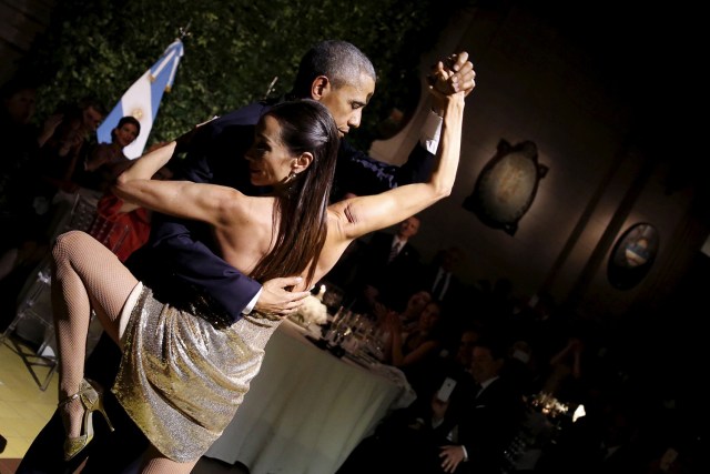 FILE PHOTO - U.S. President Barack Obama dances tango during a state dinner hosted by Argentina's President Mauricio Macri at the Centro Cultural Kirchner as part of President Obama's two-day visit to Argentina, in Buenos Aires March 23, 2016. REUTERS/Carlos Barria/File Photo REUTERS PICTURES OF THE YEAR 2016 - SEARCH 'POY 2016' TO FIND ALL IMAGES