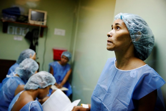 FILE PHOTO - Women wait for sterilization surgery a hospital in Caracas, Venezuela July 27, 2016. REUTERS/Carlos Garcia Rawlins/File Photo REUTERS PICTURES OF THE YEAR 2016 - SEARCH 'POY 2016' TO FIND ALL IMAGES