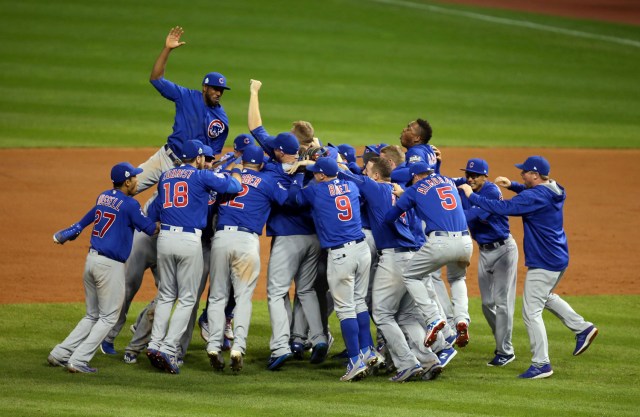 FILE PHOTO - Nov 2, 2016; Cleveland, OH, USA; Chicago Cubs players celebrate after defeating the Cleveland Indians in game seven of the 2016 World Series at Progressive Field. Mandatory Credit: Charles LeClaire-USA TODAY Sports/File Photo REUTERS PICTURES OF THE YEAR 2016 - SEARCH 'POY 2016' TO FIND ALL IMAGES