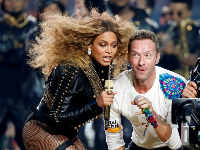 FILE PHOTO - Beyonce and Chris Martin of Coldplay perform during the half-time show at the NFL's Super Bowl 50 between the Carolina Panthers and the Denver Broncos in Santa Clara, California February 7, 2016. REUTERS/Lucy Nicholson/File Photo REUTERS PICTURES OF THE YEAR 2016 - SEARCH 'POY 2016' TO FIND ALL IMAGES