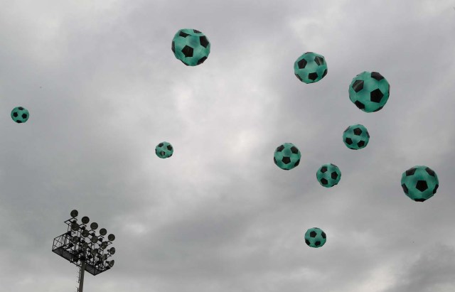 Soccer balls in homage to the Chapecoense team of Brazil are seen during the 16th Solar Balloon Festival in Envigado, Colombia