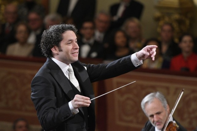 Venezulean conductor Gustavo Dudamel conducts the traditional New Year's Concert 2017 with the Vienna Philharmonic Orchestra at the Vienna Musikverein in Vienna, Austria, on January 1, 2017. / AFP PHOTO / APA / HERBERT NEUBAUER / Austria OUT