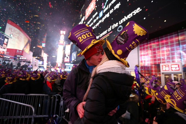 Revelers embrace at the start of 2017 at the New Year's celebration in Times Square in Manhattan, New York City, U.S., January 1, 2017. REUTERS/Stephen Yang     TPX IMAGES OF THE DAY