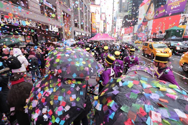 NEW YORK, NY - DECEMBER 29: Times Square Alliance and Countdown Entertainment, co-organizers of Times Square New Years Eve, along with presenting sponsor, Planet Fitness test the air worthiness of the New Years Eve confetti from the Hard Rock Cafe marquee on December 29, 2016 in New York City.   Neilson Barnard/Getty Images/AFP