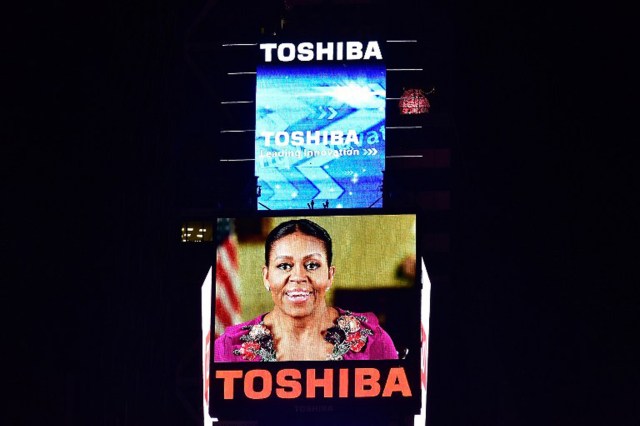 NEW YORK, NY - DECEMBER 31: Michelle Obama speaks in a video message during the New Year's Eve Countdown at Times Square on December 31, 2016 in New York City.   Eugene Gologursky/Getty Images for TOSHIBA CORPORATION/AFP