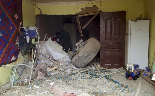 A Turkish cargo jet wheel is seen at the crash site near Kyrgyzstan's Manas airport outside Bishkek, January 16, 2017. Radio Free Europe/Radio Liberty/Handout via REUTERS  NO SALES. FOR EDITORIAL USE ONLY. NOT FOR SALE FOR MARKETING OR ADVERTISING CAMPAIGNS. THIS IMAGE HAS BEEN SUPPLIED BY A THIRD PARTY. IT IS DISTRIBUTED, EXACTLY AS RECEIVED BY REUTERS, AS A SERVICE TO CLIENTS.