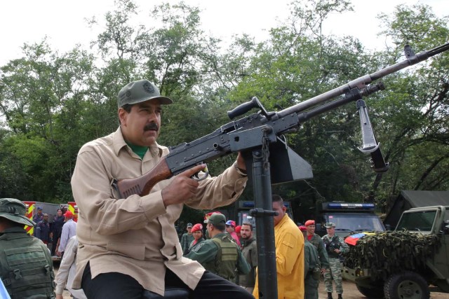 Venezuela's President Nicolas Maduro takes part in a military drill in Charallave, Venezuela January 14, 2017. Miraflores Palace/Handout via REUTERS ATTENTION EDITORS - THIS PICTURE WAS PROVIDED BY A THIRD PARTY. EDITORIAL USE ONLY.