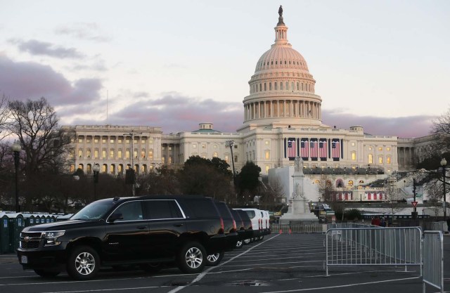 WASHINGTON, DC - JANUARY 18: Vehicles are lined up in front of the U.S. Capitol building ahead of inauguration ceremonies for President-elect Donald Trump on January 18, 2017 in Washington, DC. Trump will be sworn in as the 45th U.S, president on January 20.   Mario Tama/Getty Images/AFP