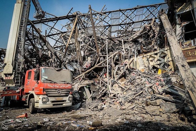 A view shows the remains of a collapsed high-rise building in Tehran, Iran January 19, 2017. Tasnim News Agency/Handout via REUTERS ATTENTION EDITORS - THIS PICTURE WAS PROVIDED BY A THIRD PARTY. FOR EDITORIAL USE ONLY. NO RESALES. NO ARCHIVE.