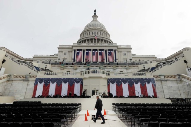 Workers prepare for the inauguration of U.S. President-Elect Donald Trump at the U.S. Capitol in Washington, DC, U.S., January 19, 2017. REUTERS/Brian Snyder